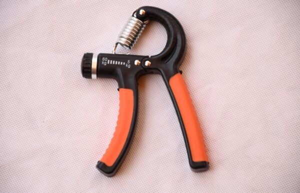 adjustable handgrip strengthener, grip strength tool, hand exercise equipment, wrist strengthener, forearm trainer, portable hand trainer, durable hand gripper, ergonomic grip tool, fitness gear, hand rehabilitation tool