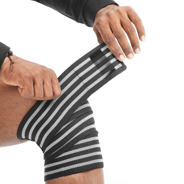 knee wrap, knee support, gym knee brace, adjustable knee strap, compression wrap, bessgym knee wrap, joint support, injury prevention, knee stability, leg wrap for workouts